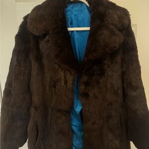 Elegant Brown Fur Coat
Vintage, satin lining, beautiful condition.